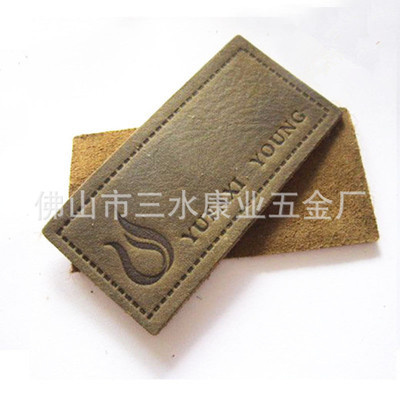 佛山市三水康業(yè)五金廠 專業(yè)提供中高檔熱壓絲印皮標(biāo)皮牌，助力服裝服飾品牌升級